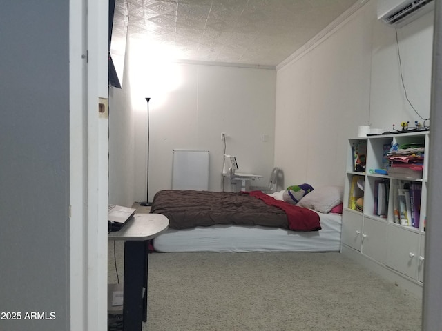 1226 N Mckinley Ave, Ajo, AZ 85321 - bedroom featuring an AC wall unit, carpet, and crown molding