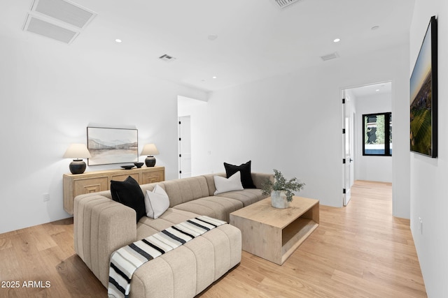 7341 E Sunnyside Dr, Scottsdale, AZ 85260 - living area featuring light wood-type flooring and recessed lighting
