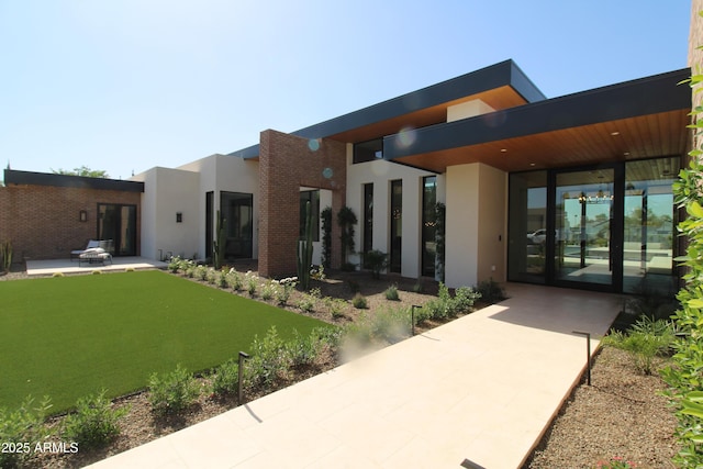 7341 E Sunnyside Dr, Scottsdale, AZ 85260 - back of house featuring stucco siding