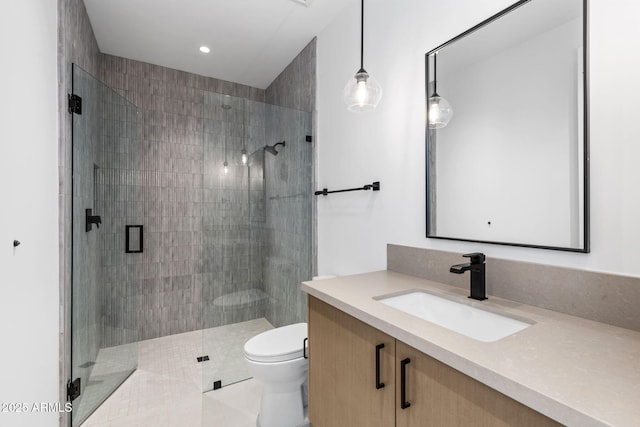 7341 E Sunnyside Dr, Scottsdale, AZ 85260 - bathroom with vanity, toilet, a shower stall, recessed lighting, and tile patterned floors