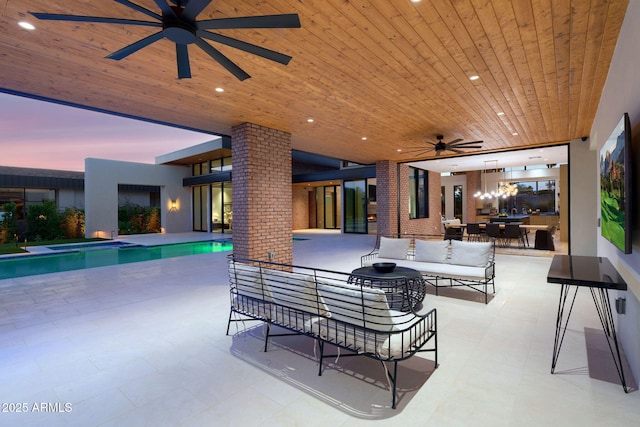 7341 E Sunnyside Dr, Scottsdale, AZ 85260 - view of patio / terrace with ceiling fan, outdoor lounge area, an outdoor pool, and outdoor dining space