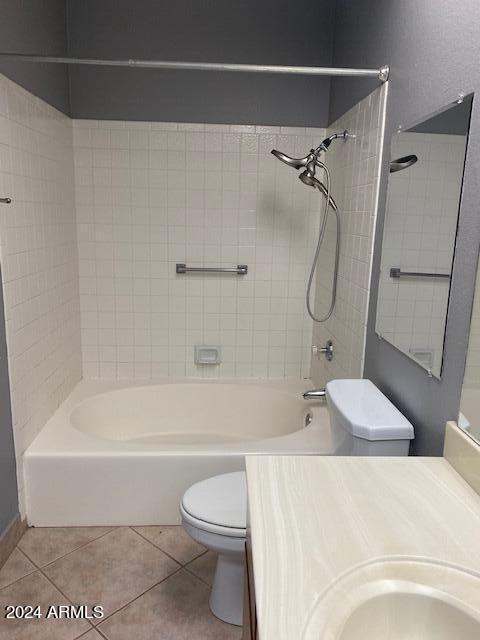 full bath with vanity, toilet, bathing tub / shower combination, and tile patterned flooring