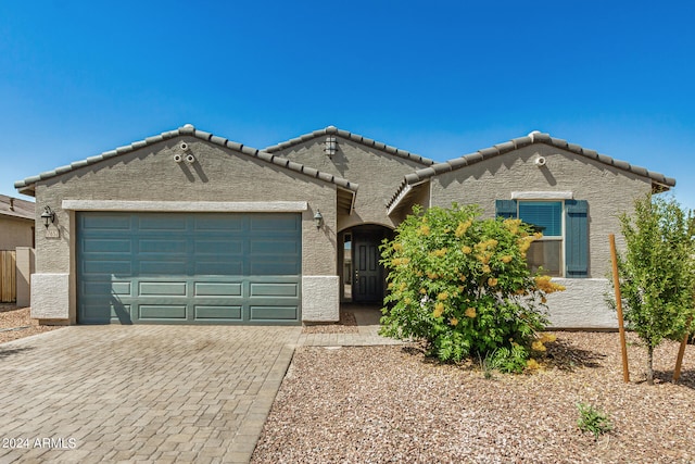 view of front of property featuring a garage