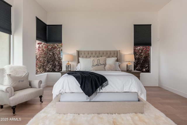 12366 N 129th St, Scottsdale, AZ 85259 - bedroom featuring wood finished floors and baseboards