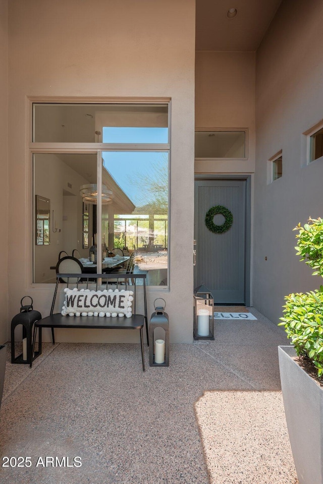 12366 N 129th St, Scottsdale, AZ 85259 - doorway to property featuring stucco siding