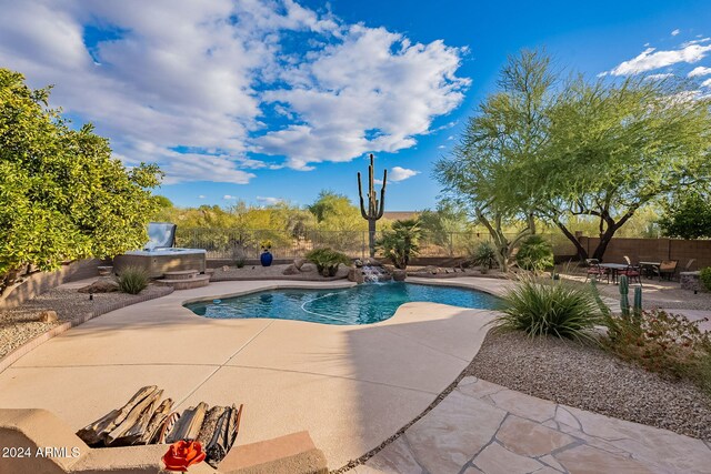 view of pool with a patio area