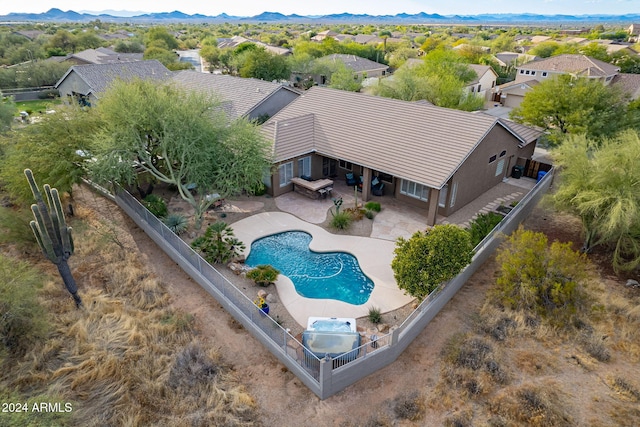 drone / aerial view featuring a mountain view