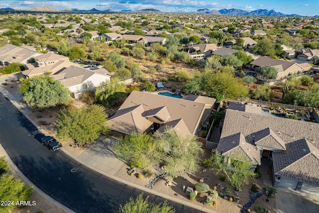 bird's eye view with a mountain view