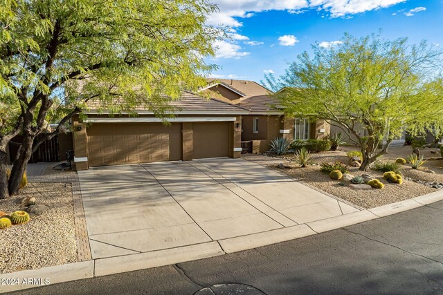 view of front of property with a garage