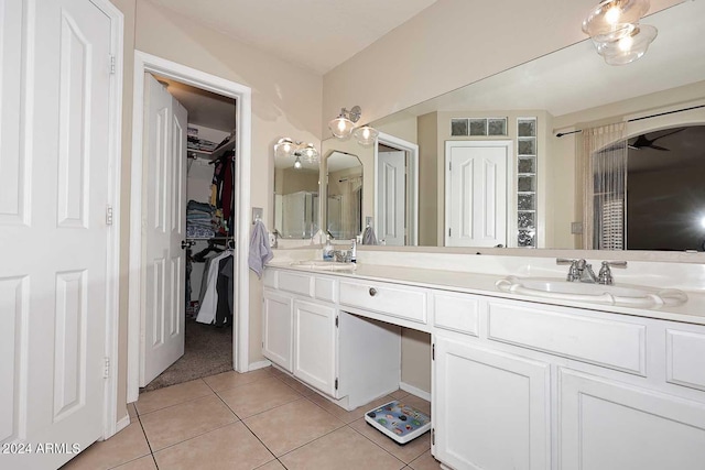 bathroom featuring vanity and tile patterned flooring