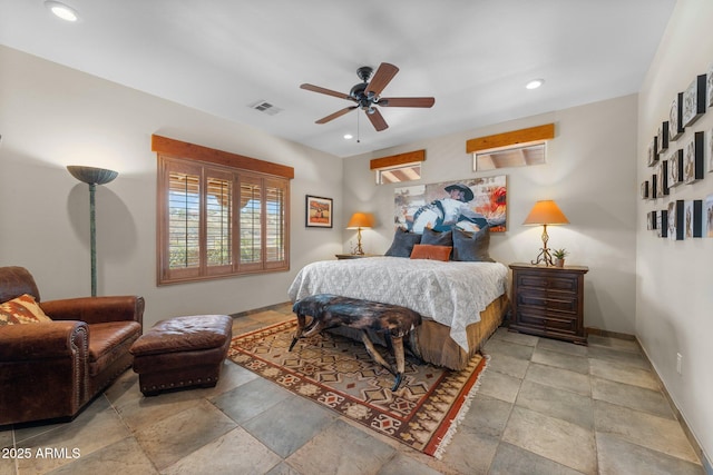 bedroom with recessed lighting, baseboards, visible vents, and stone finish flooring