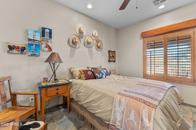 bedroom featuring visible vents, recessed lighting, a ceiling fan, and stone finish floor