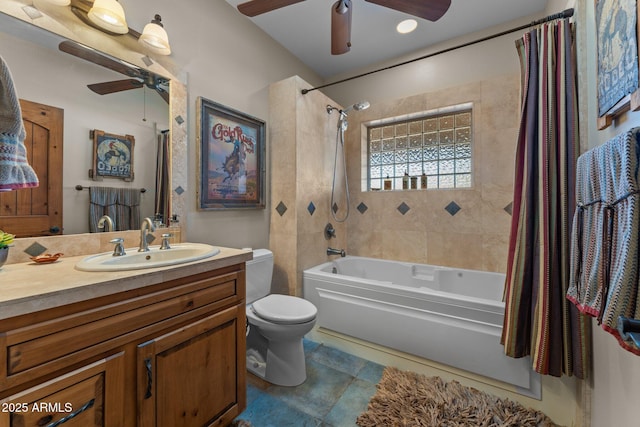 bathroom with shower / bath combination with curtain, toilet, vanity, and ceiling fan