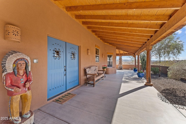 view of patio / terrace featuring fence