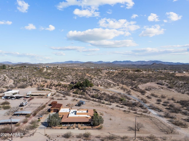 bird's eye view featuring view of desert and a mountain view