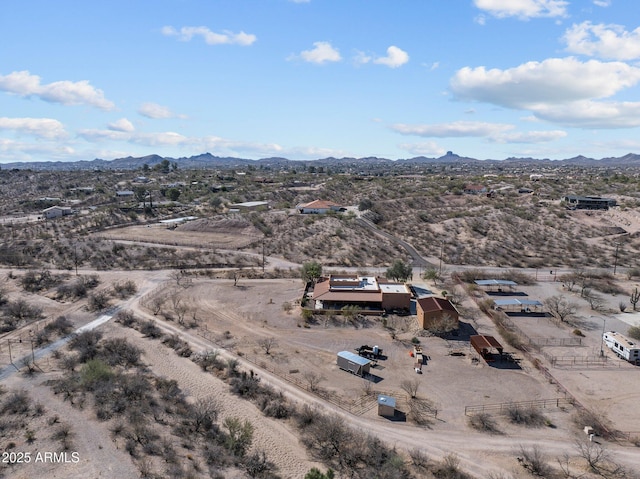 birds eye view of property featuring a mountain view