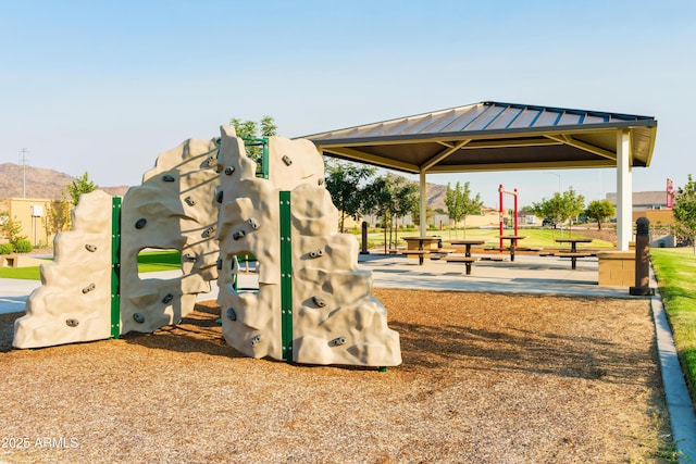 surrounding community with playground community and a gazebo