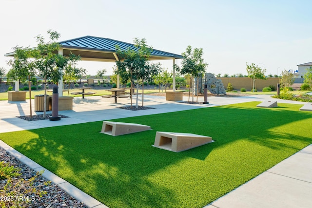 view of community featuring a yard and a gazebo