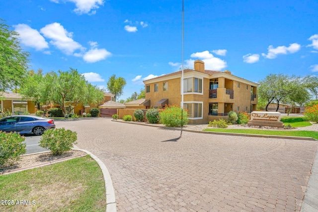 1411 E Orangewood Ave Unit 237, Phoenix, AZ 85020 - view of road featuring curbs