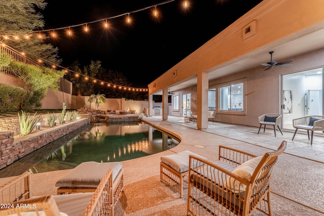 view of swimming pool with a patio area and ceiling fan