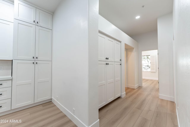 hallway featuring light hardwood / wood-style floors