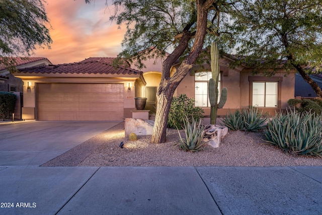 view of front of house with a garage