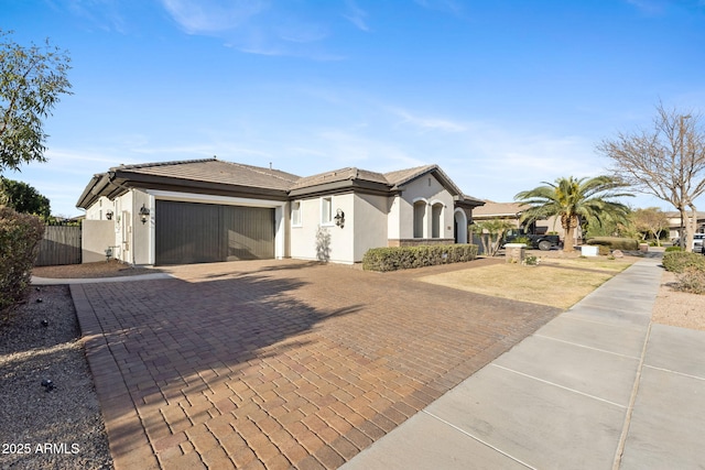 view of front of property featuring a garage