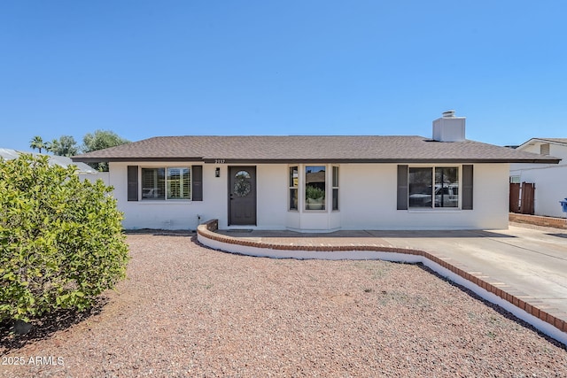 2337 E Contessa St, Mesa, AZ 85213 - single story home with a chimney and roof with shingles