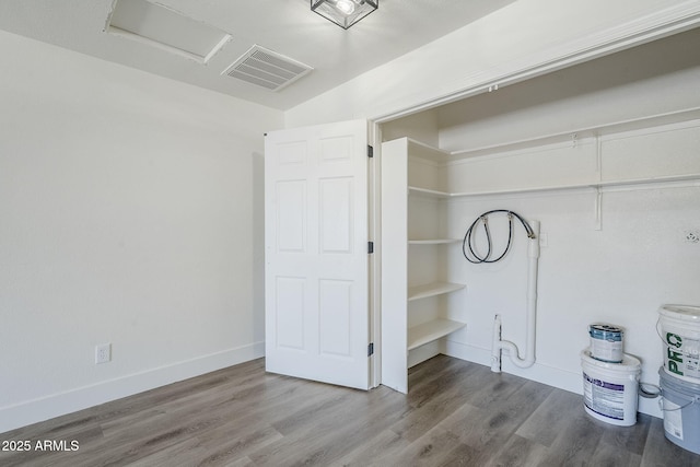 2337 E Contessa St, Mesa, AZ 85213 - laundry room with wood finished floors and baseboards