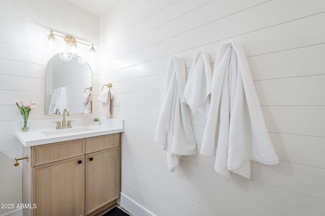 2337 E Contessa St, Mesa, AZ 85213 - bathroom featuring vanity and wooden walls