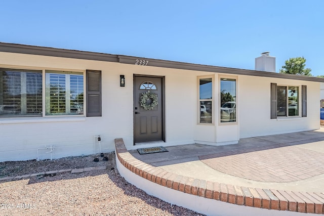 2337 E Contessa St, Mesa, AZ 85213 - doorway to property with a chimney