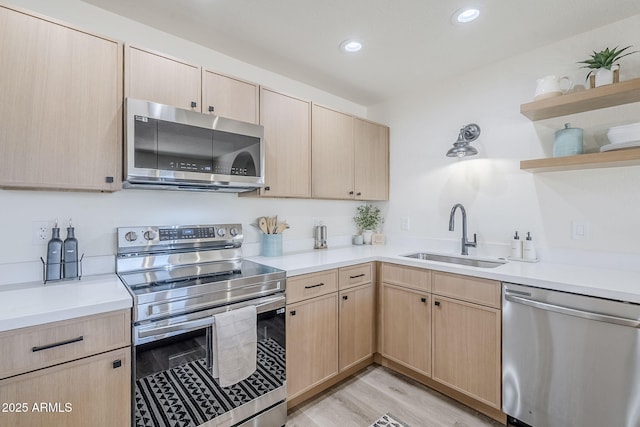 2337 E Contessa St, Mesa, AZ 85213 - kitchen with stainless steel appliances, light brown cabinets, light countertops, and recessed lighting