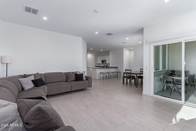 living room featuring light hardwood / wood-style floors