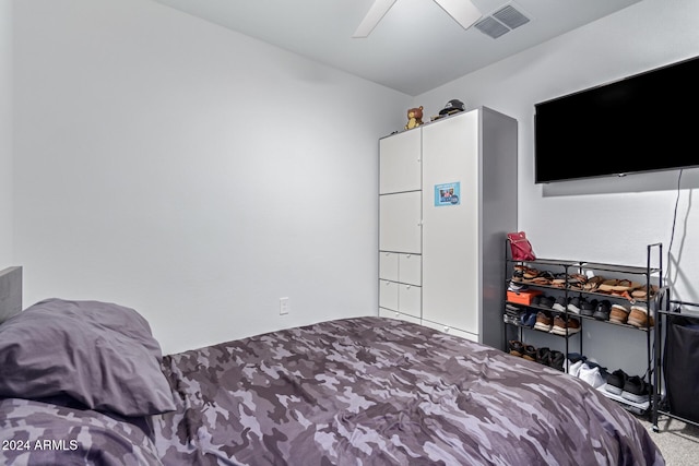 bedroom featuring ceiling fan and carpet floors