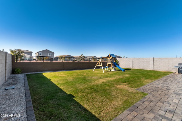 view of yard with a playground