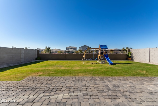 view of yard featuring a playground