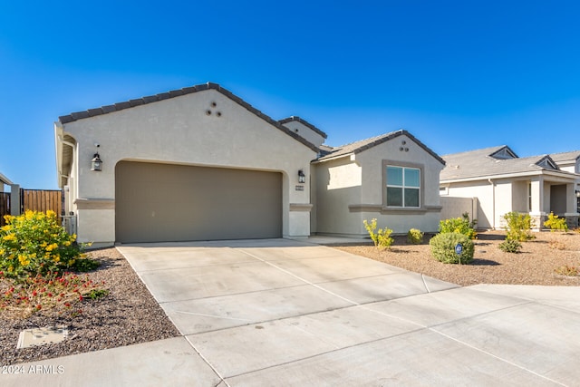 view of front of home with a garage