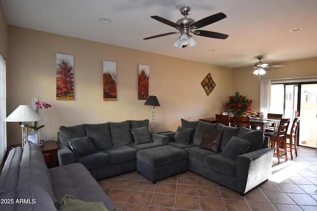 tiled living room featuring a ceiling fan and recessed lighting