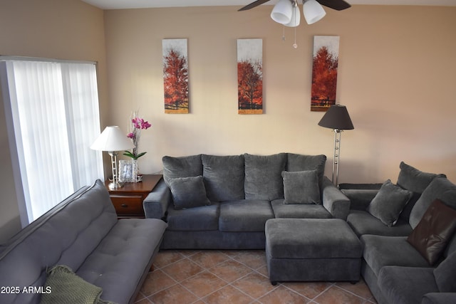 tiled living room with ceiling fan