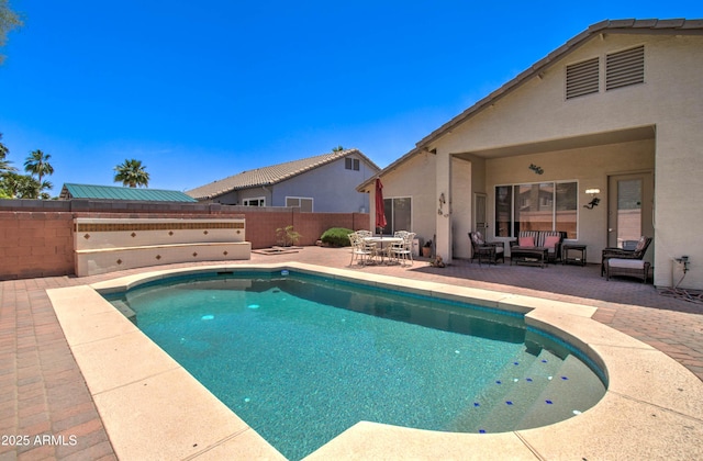 14298 W Amelia Ave, Goodyear, AZ 85395 - view of swimming pool featuring a patio area and a fenced backyard