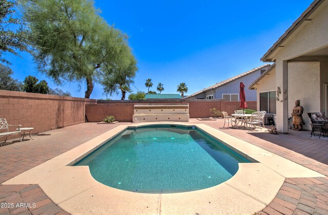 14298 W Amelia Ave, Goodyear, AZ 85395 - view of pool with a fenced backyard and a patio area