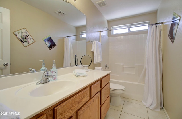 14298 W Amelia Ave, Goodyear, AZ 85395 - full bathroom with tile patterned floors, vanity, toilet, and shower / bath combination with curtain