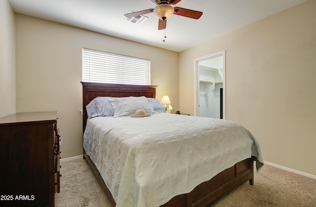 14298 W Amelia Ave, Goodyear, AZ 85395 - bedroom featuring carpet floors, baseboards, and ceiling fan