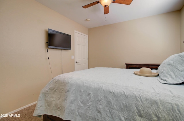 14298 W Amelia Ave, Goodyear, AZ 85395 - carpeted bedroom featuring baseboards and a ceiling fan