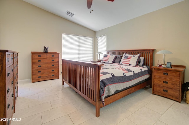 14298 W Amelia Ave, Goodyear, AZ 85395 - bedroom with vaulted ceiling, light tile patterned floors, and a ceiling fan