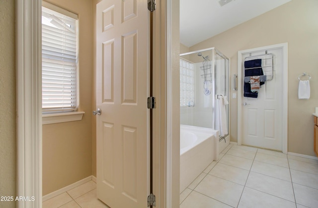 14298 W Amelia Ave, Goodyear, AZ 85395 - full bath featuring tile patterned flooring, a stall shower, and a garden tub