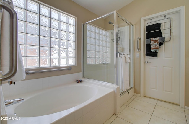 14298 W Amelia Ave, Goodyear, AZ 85395 - full bath featuring a stall shower, a bath, and tile patterned flooring