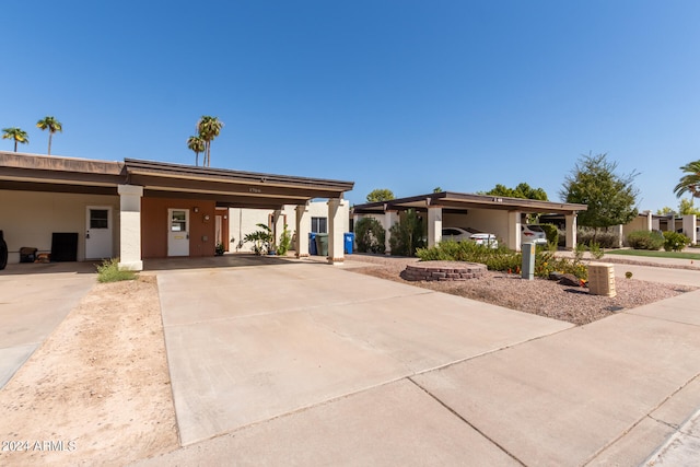 view of front of home featuring a carport