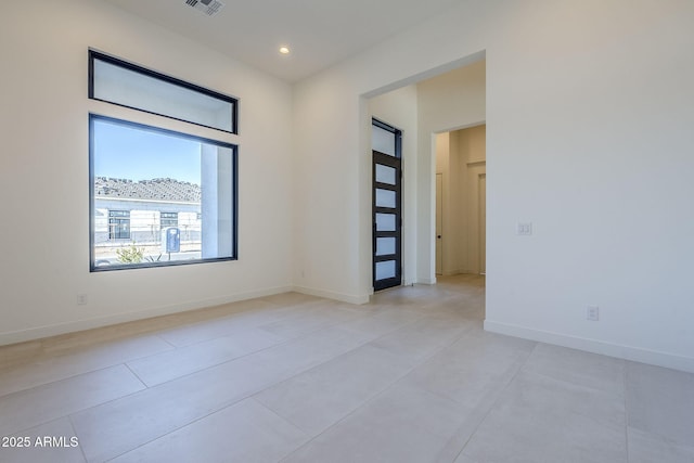 view of tiled spare room