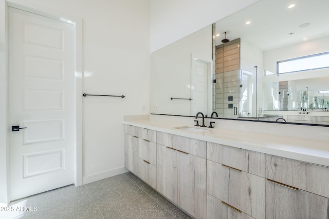 bathroom featuring vanity and walk in shower